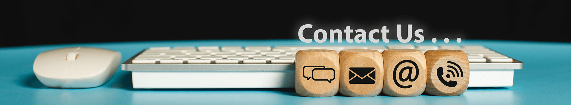 Photo showing a keyboard and different icons for contact methods
